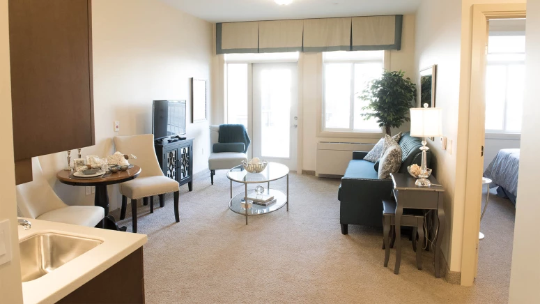 Living room in senior apartments at MacTaggart Place